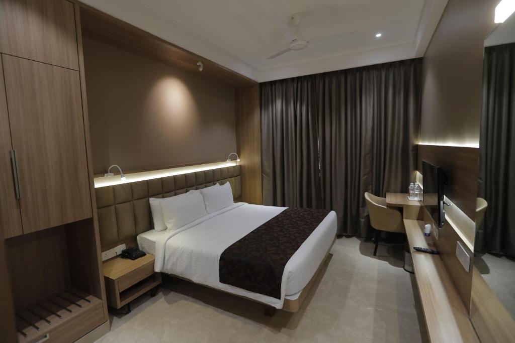 Postel nebo postele na pokoji v ubytování Hotel Radiance