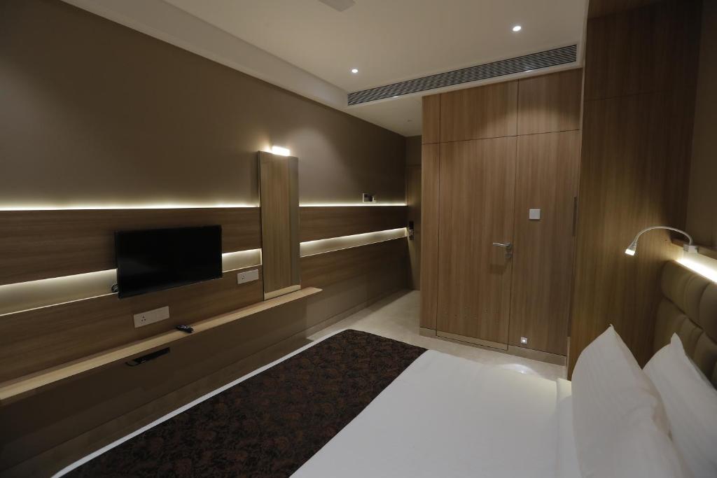 TV a/nebo společenská místnost v ubytování Hotel Radiance
