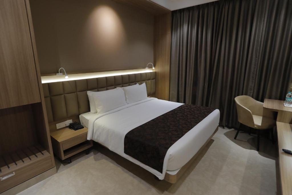 Postel nebo postele na pokoji v ubytování Hotel Radiance