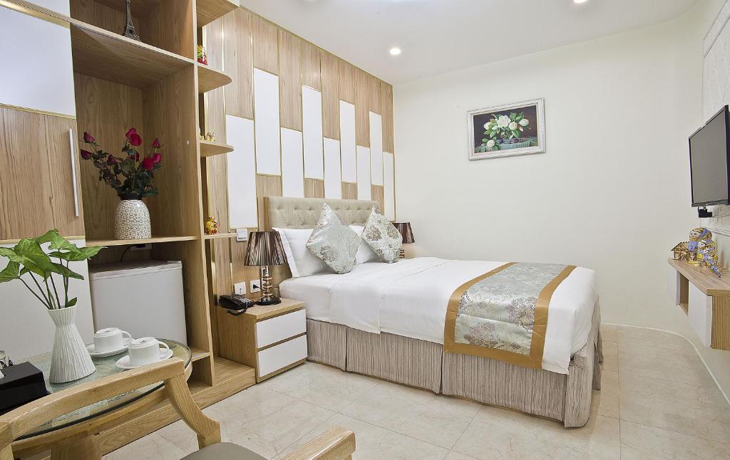 TV a/nebo společenská místnost v ubytování DLmos Hanoi Hotel