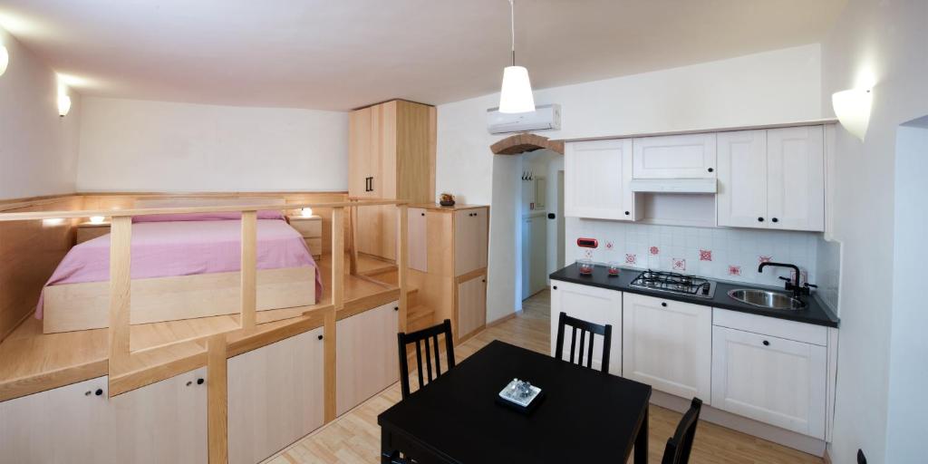 Kuchyňa alebo kuchynka v ubytovaní La Sentinella Holiday House