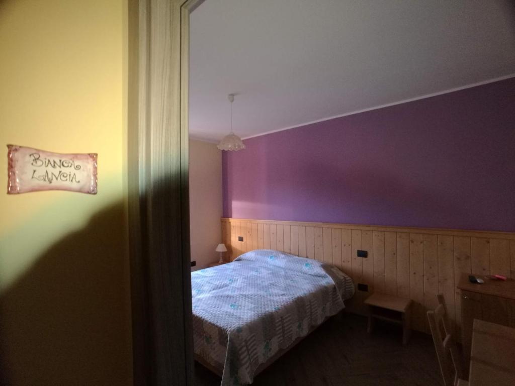 Postel nebo postele na pokoji v ubytování Lacus Pensilis