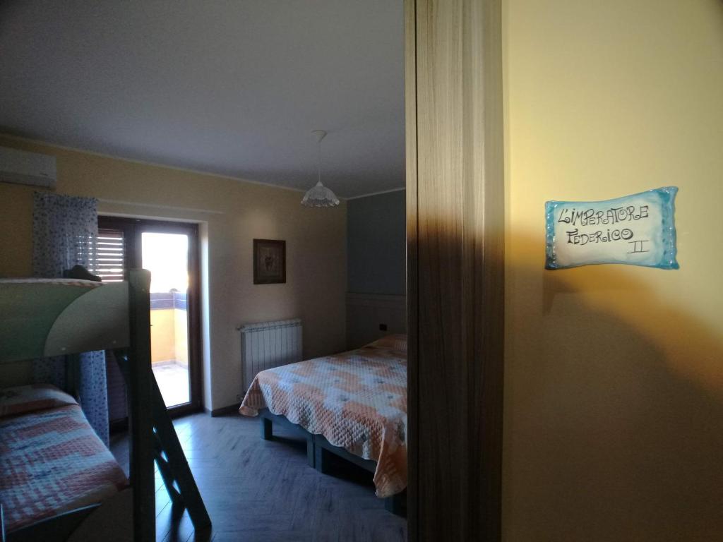 Postel nebo postele na pokoji v ubytování Lacus Pensilis