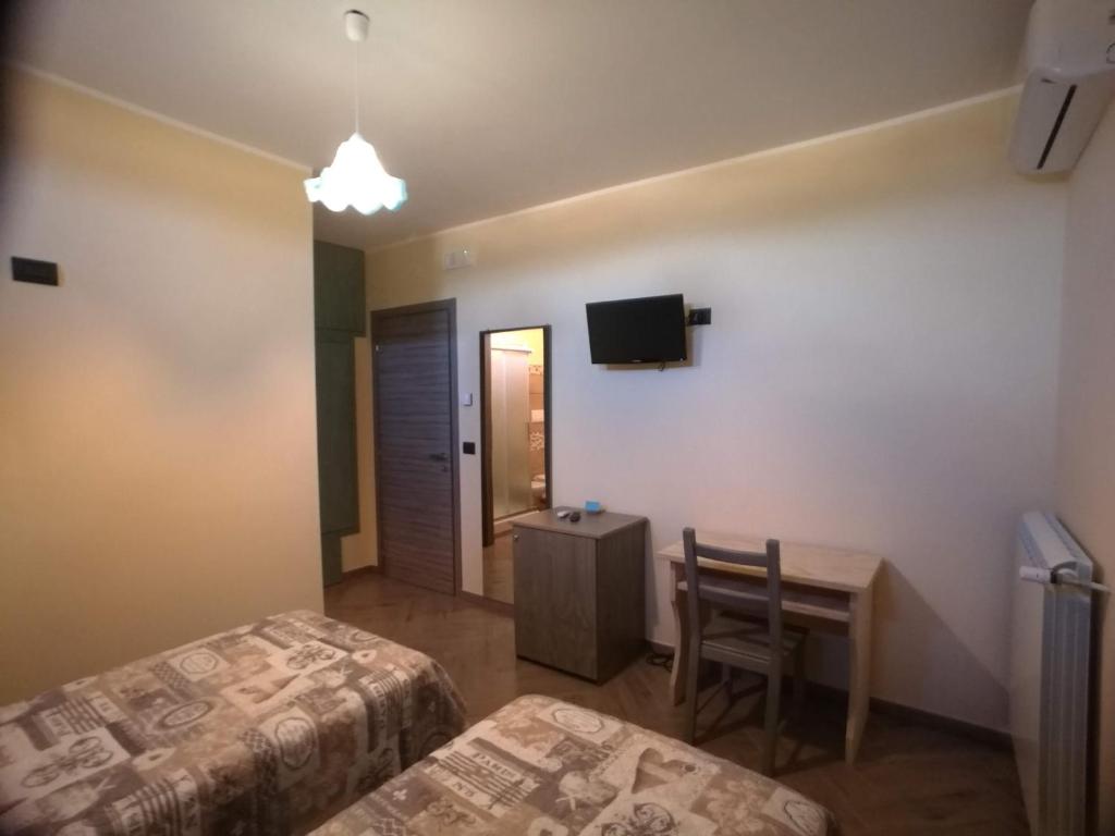 Postel nebo postele na pokoji v ubytování Lacus Pensilis