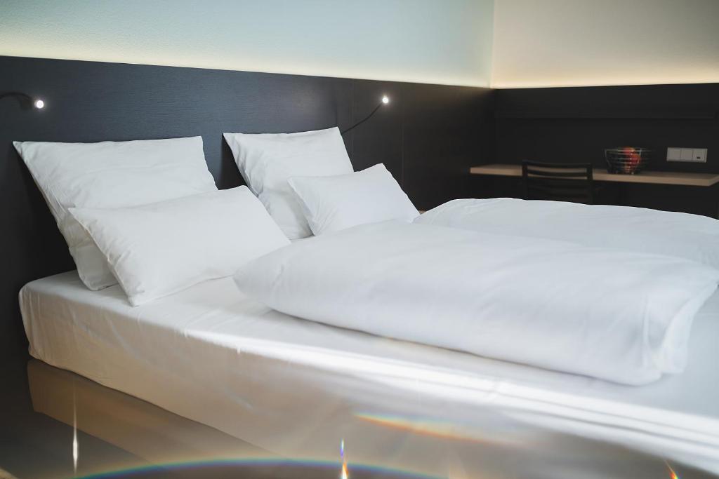 Postel nebo postele na pokoji v ubytování Hotel U7