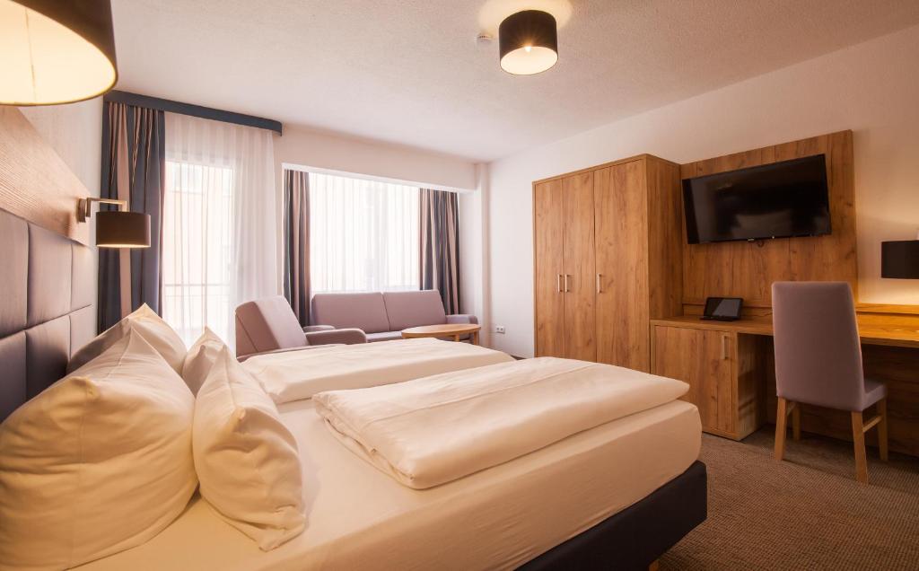 Postel nebo postele na pokoji v ubytování Sure Hotel by Best Western Wilhelmshaven City