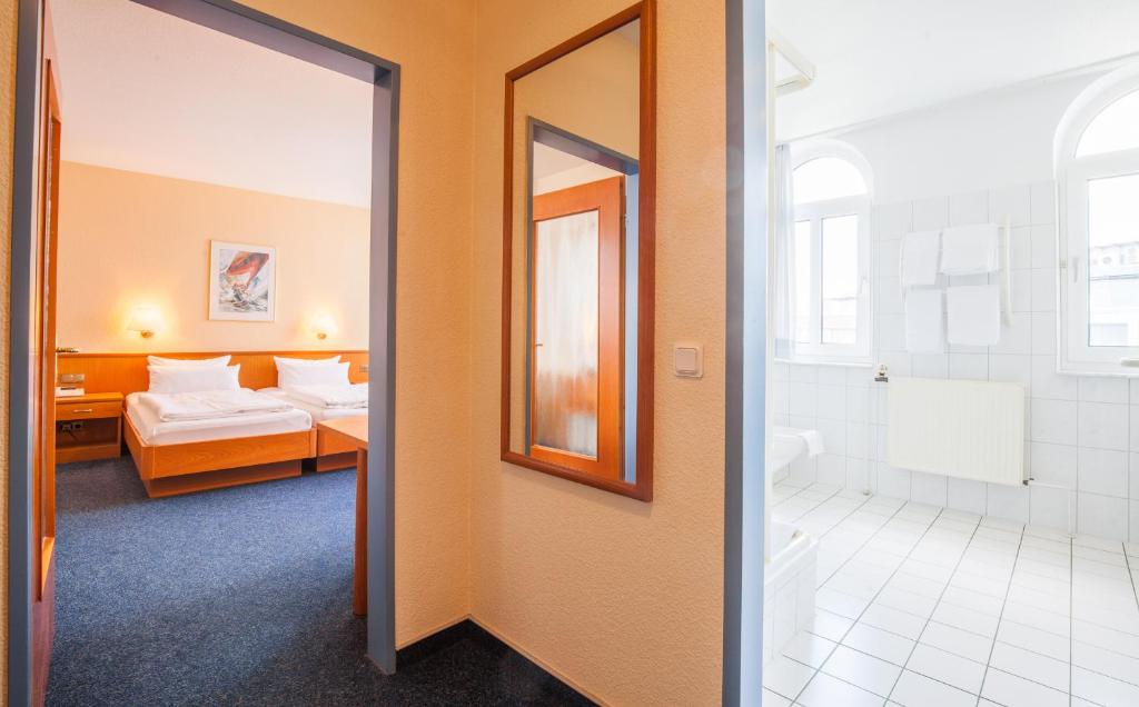 Postel nebo postele na pokoji v ubytování Sure Hotel by Best Western Wilhelmshaven City