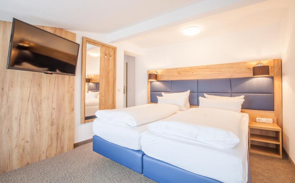 Postel nebo postele na pokoji v ubytování Sure Hotel by Best Western Wilhelmshaven City