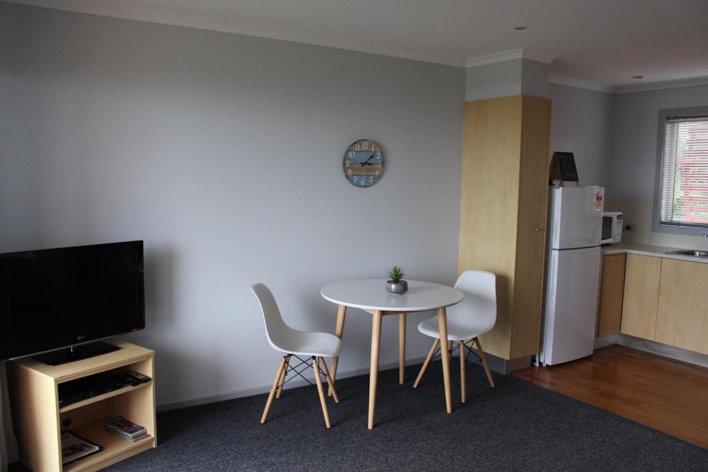 TV a/nebo společenská místnost v ubytování Aqualuna Apartments