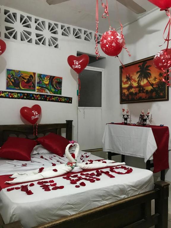 Postel nebo postele na pokoji v ubytování Hostal La Española de Getsemani
