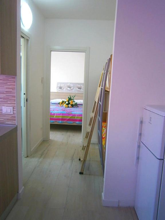 A bed or beds in a room at Cà Bianca