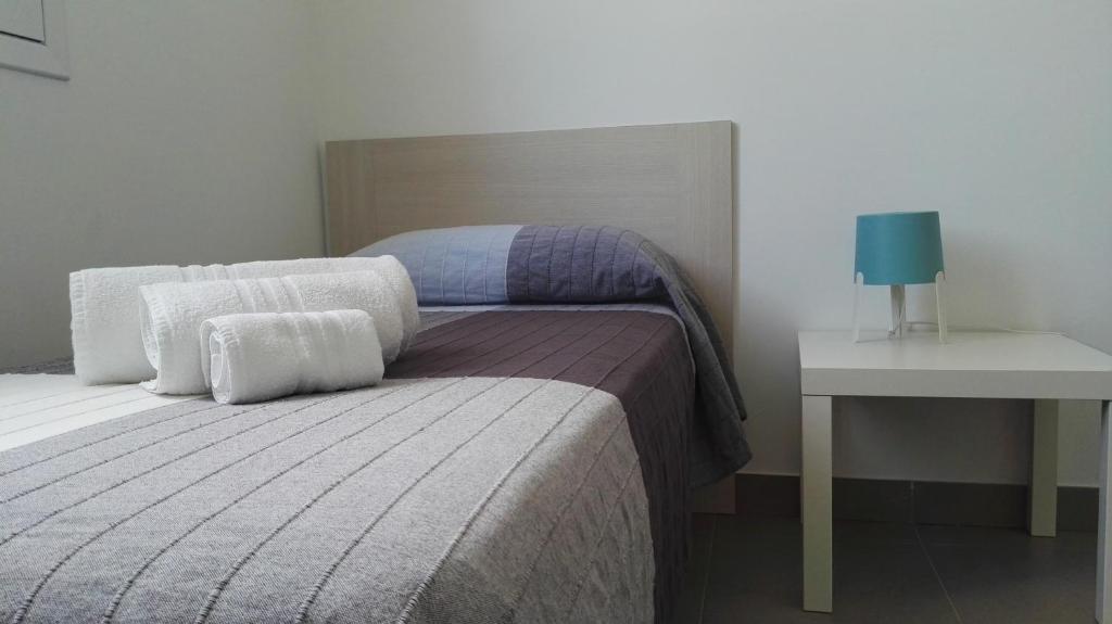 Postel nebo postele na pokoji v ubytování Casimari San Lorenzo
