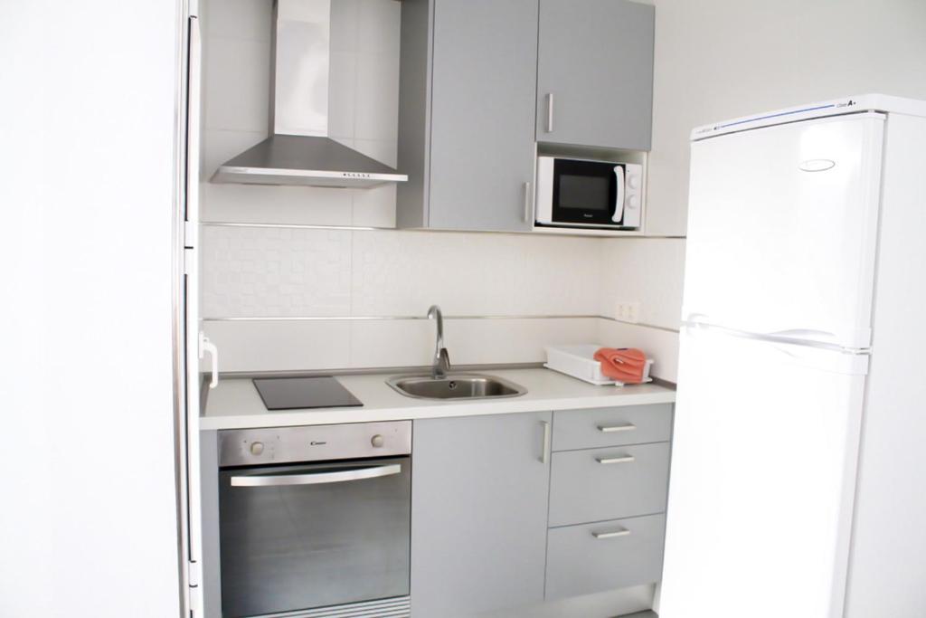 Kuchyňa alebo kuchynka v ubytovaní Apartamentos El Galán II
