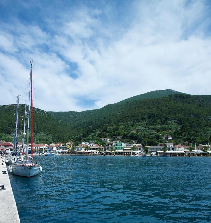 a sailboat is docked in a body of water at Muses Studios Sami in Sami