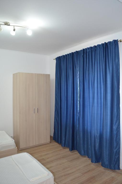 Postel nebo postele na pokoji v ubytování Ermar