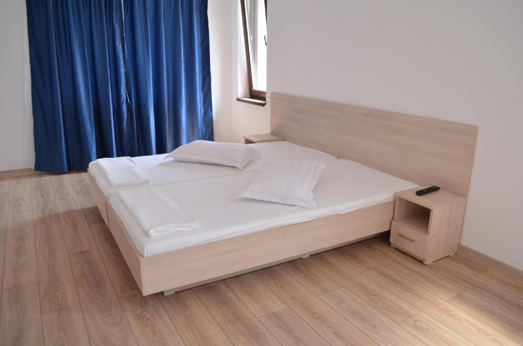 Postel nebo postele na pokoji v ubytování Ermar