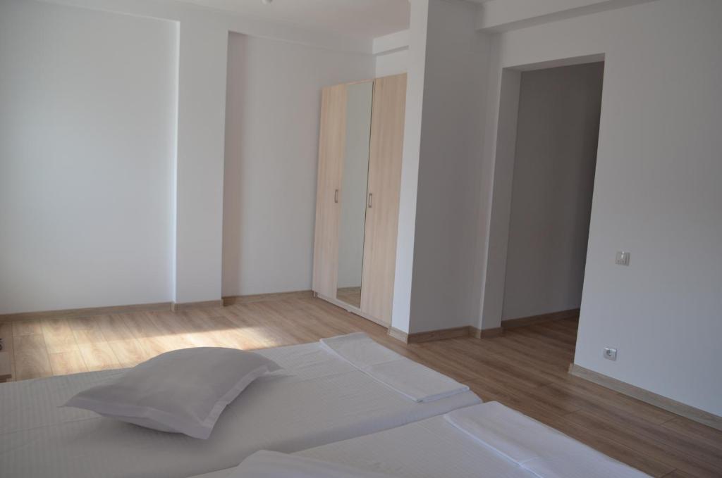Postel nebo postele na pokoji v ubytování Ermar