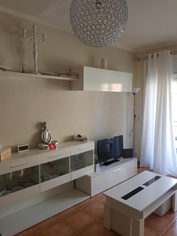 Kuchyň nebo kuchyňský kout v ubytování Apt a Calafell plage
