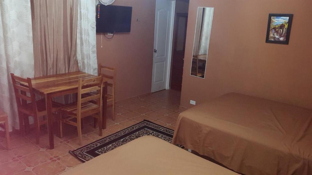 Postel nebo postele na pokoji v ubytování Cabañas Azuero
