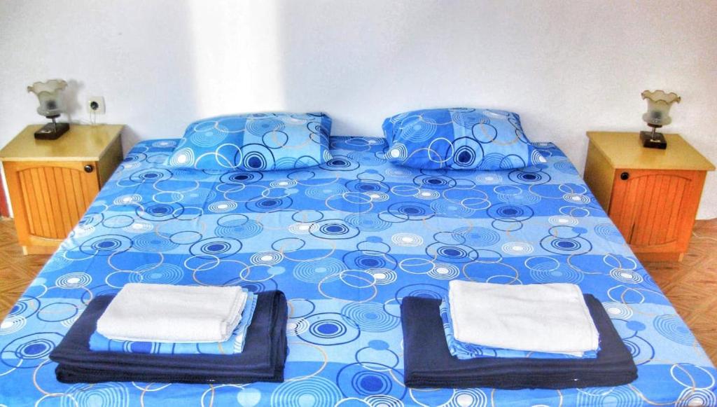 Postel nebo postele na pokoji v ubytování Guest House Dimi