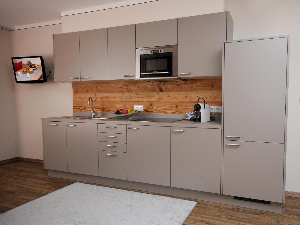 Kuchyň nebo kuchyňský kout v ubytování Ferienwohnung Eberl