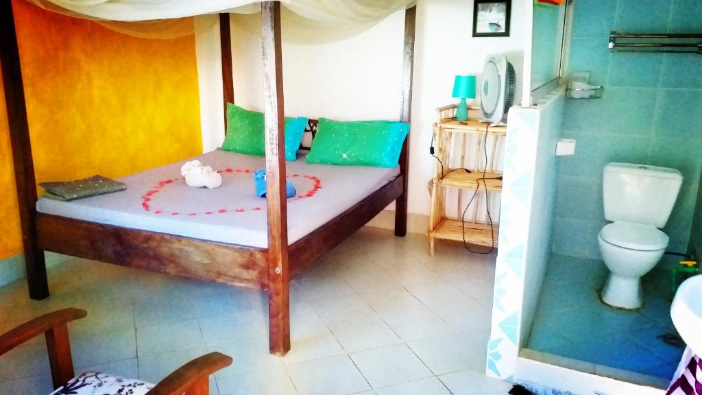 Postel nebo postele na pokoji v ubytování Diani Hostel