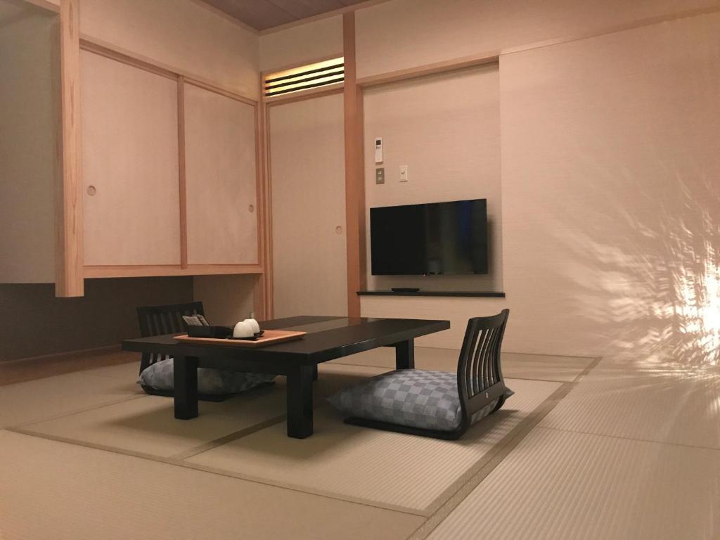 TV a/nebo společenská místnost v ubytování Japanese Style Hotel Isomura