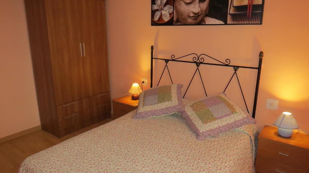 Posteľ alebo postele v izbe v ubytovaní Apartamento Orgaz