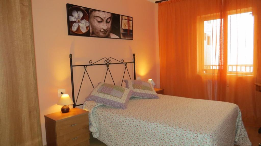 Posteľ alebo postele v izbe v ubytovaní Apartamento Orgaz