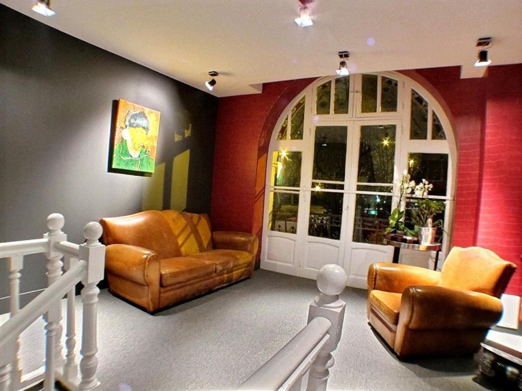 Posezení v ubytování Hôtel 19'Cent
