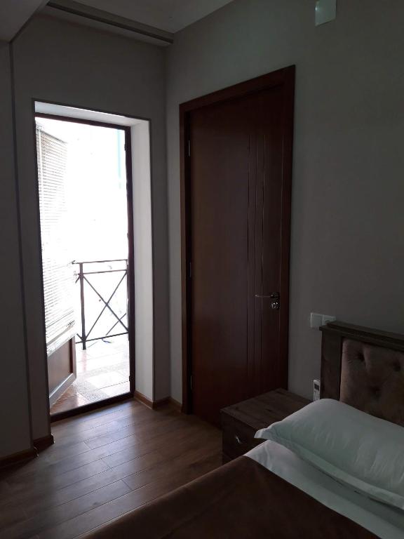 Postel nebo postele na pokoji v ubytování Guesthouse Fatima