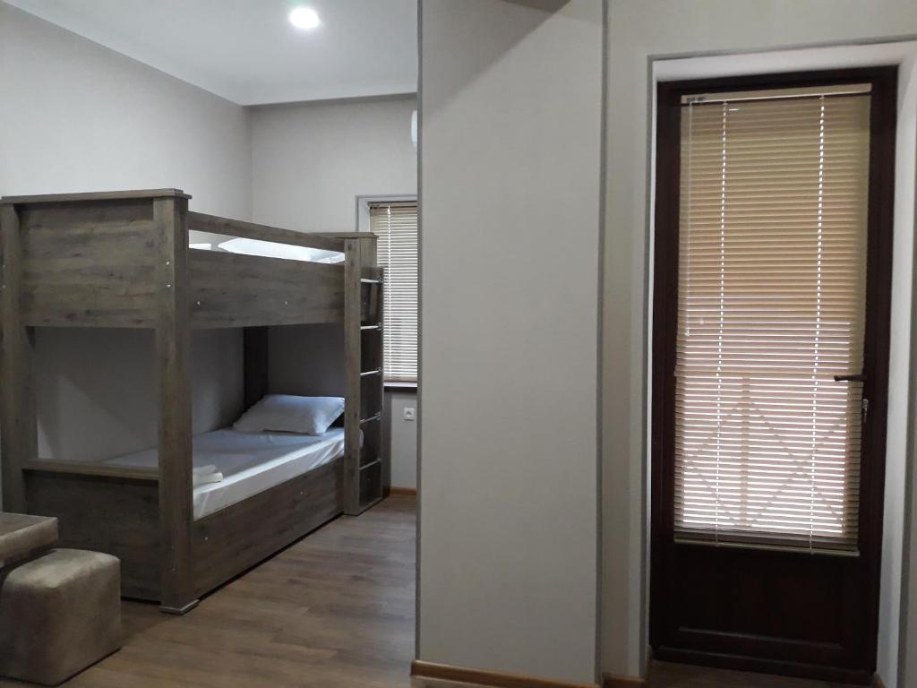 Postel nebo postele na pokoji v ubytování Guesthouse Fatima