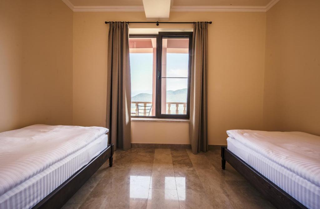 Postel nebo postele na pokoji v ubytování Lastiver Resort