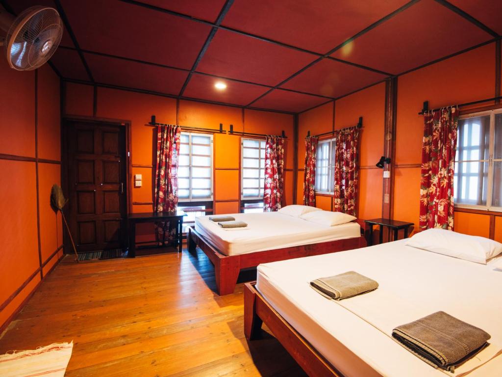 Ein Bett oder Betten in einem Zimmer der Unterkunft House of Sanskara