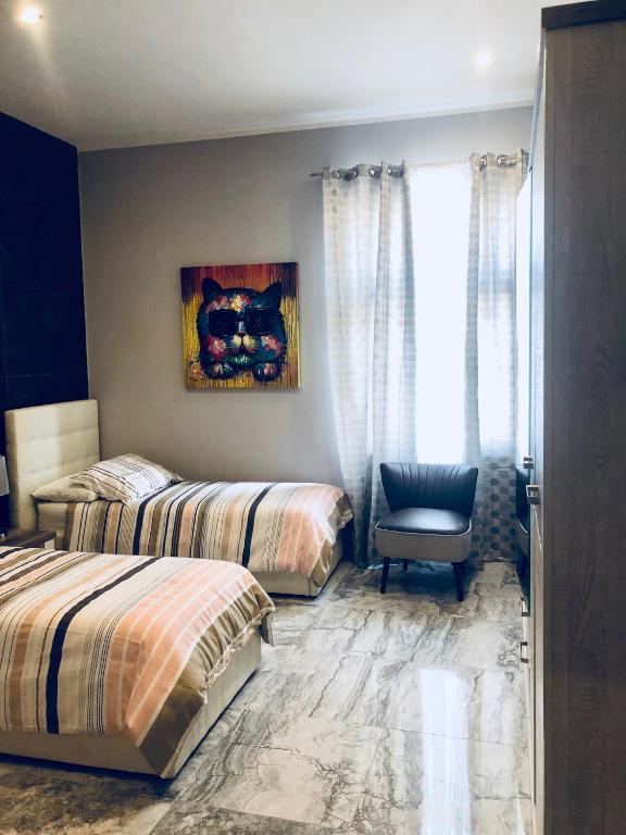 Postel nebo postele na pokoji v ubytování Holiday townhouse in Sliema centre