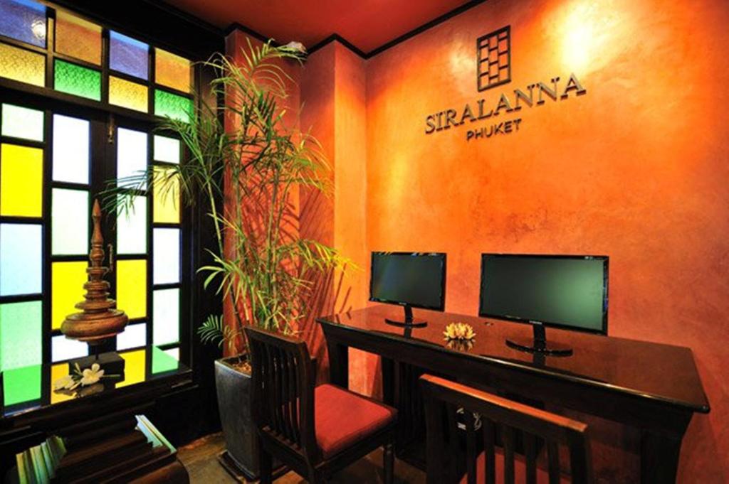 TV a/nebo společenská místnost v ubytování Siralanna Hotel