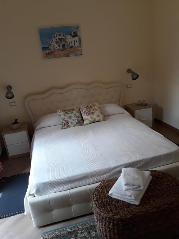 Postel nebo postele na pokoji v ubytování La Camelia B&B