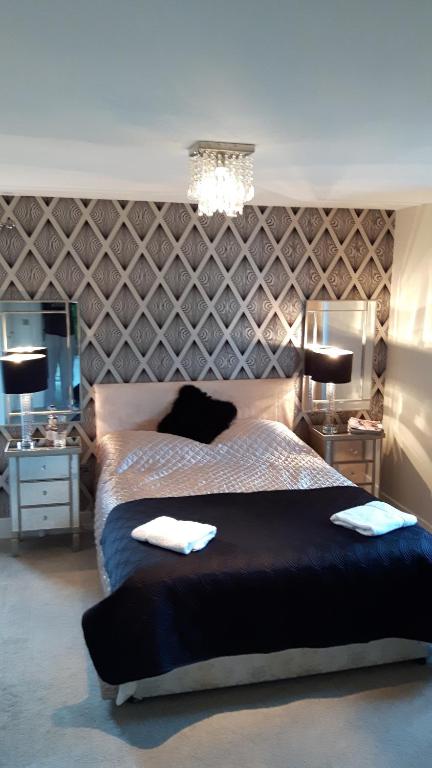 Letto o letti in una camera di Brona Dempsey