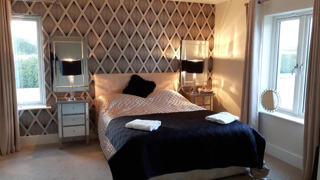 Letto o letti in una camera di Brona Dempsey
