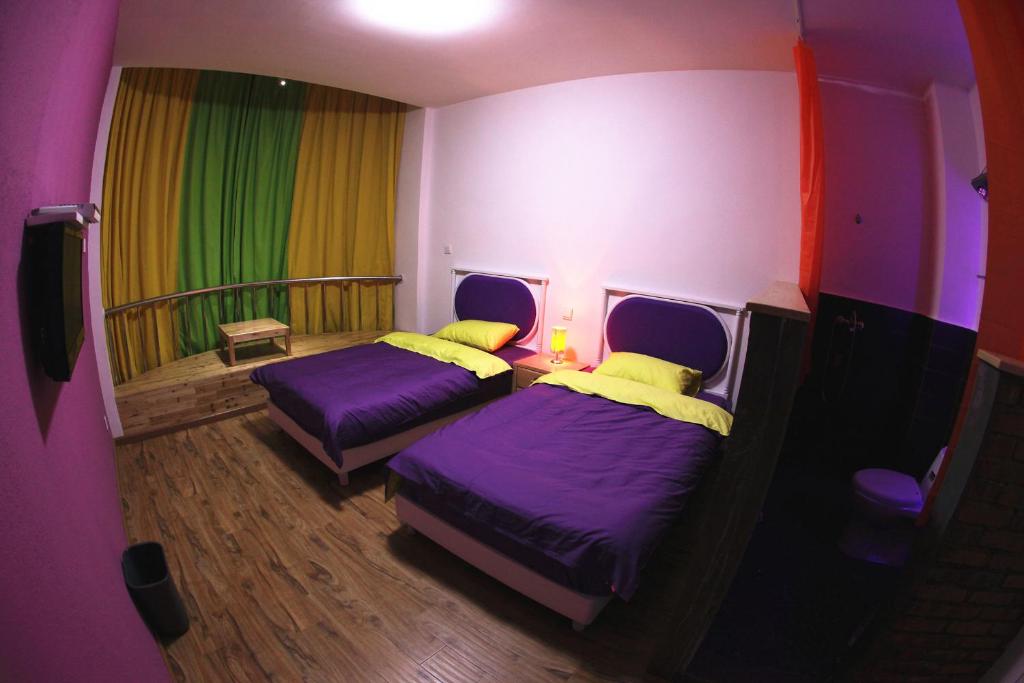 Säng eller sängar i ett rum på Dalan Youth Hostel