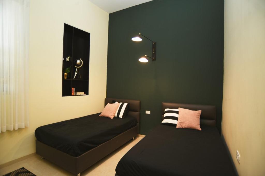Postel nebo postele na pokoji v ubytování El Sayed House b&b