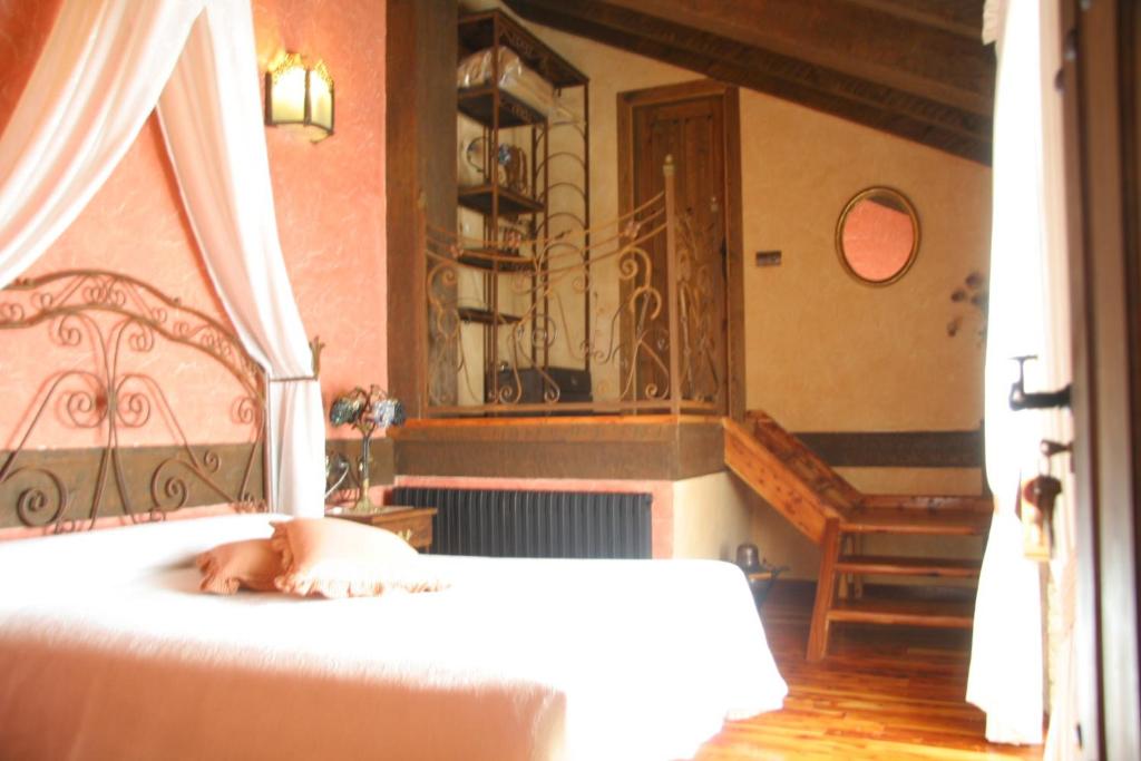 Postel nebo postele na pokoji v ubytování El Mirador de Almanzor