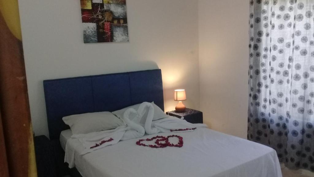 Postel nebo postele na pokoji v ubytování La Esperanza