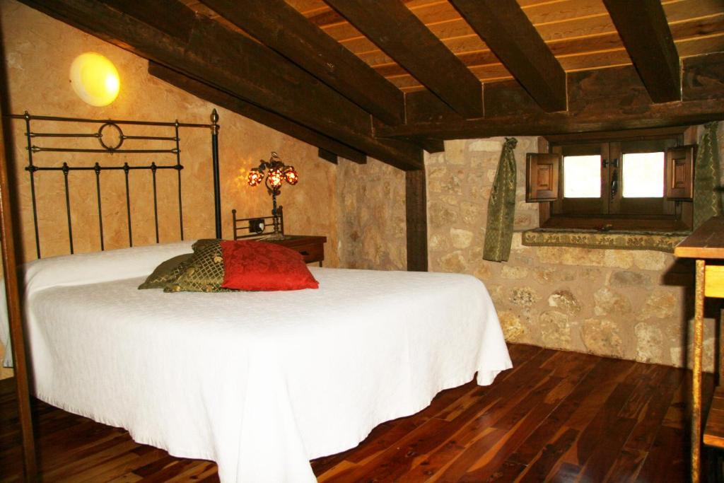 Postel nebo postele na pokoji v ubytování El Mirador de Almanzor