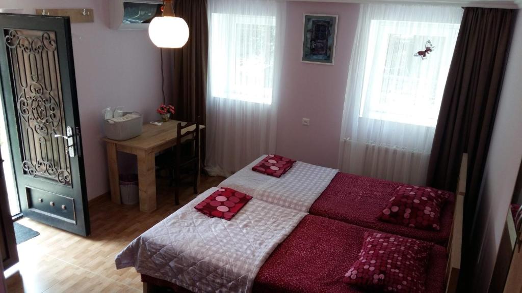 Postel nebo postele na pokoji v ubytování Guest House Panda