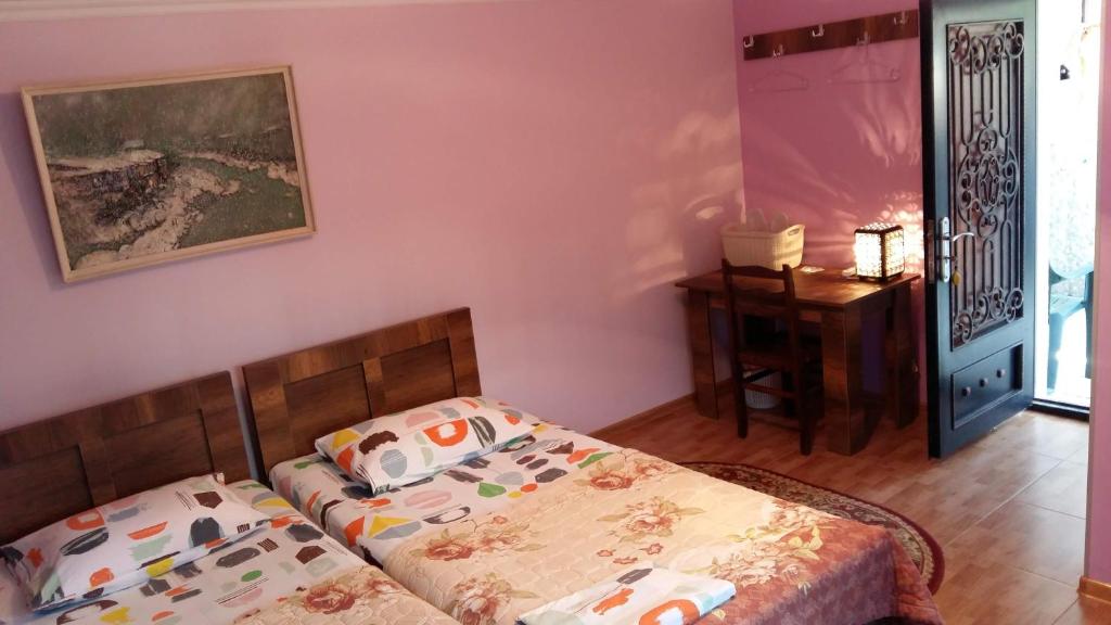 Postel nebo postele na pokoji v ubytování Guest House Panda