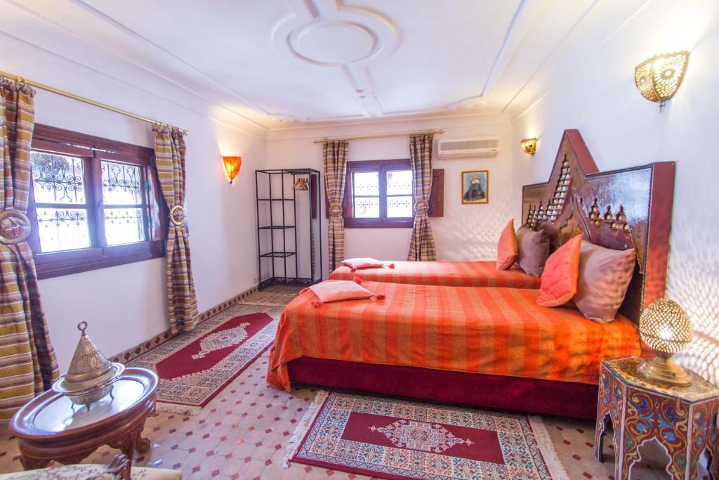 Postel nebo postele na pokoji v ubytování Riad Dar Skalli & SPA