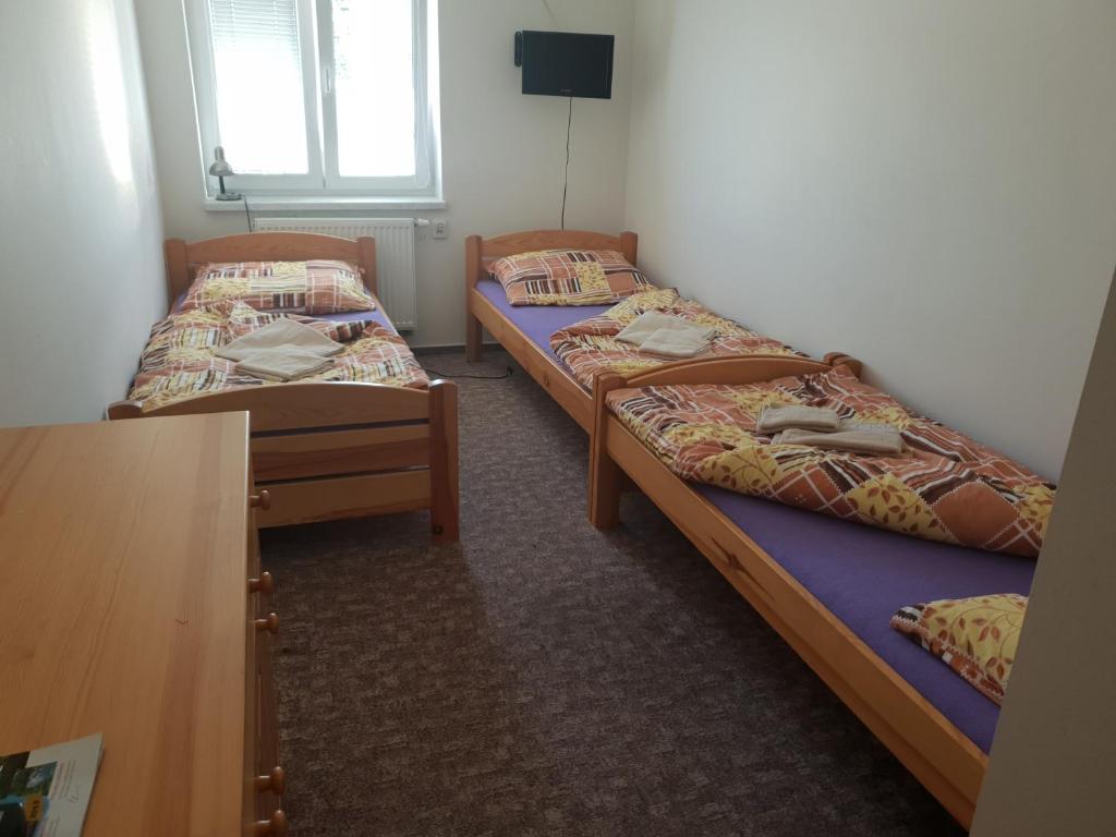 Postel nebo postele na pokoji v ubytování Ubytování U Františka