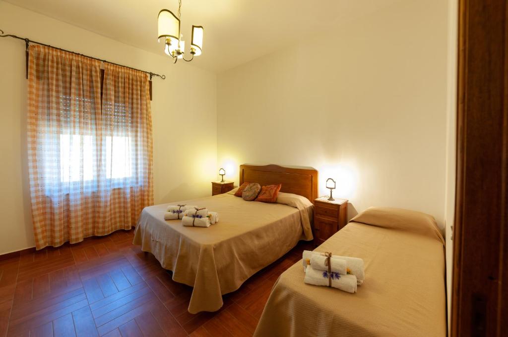 Postel nebo postele na pokoji v ubytování Azienda Agrituristica Le Terre Di San Leonardo