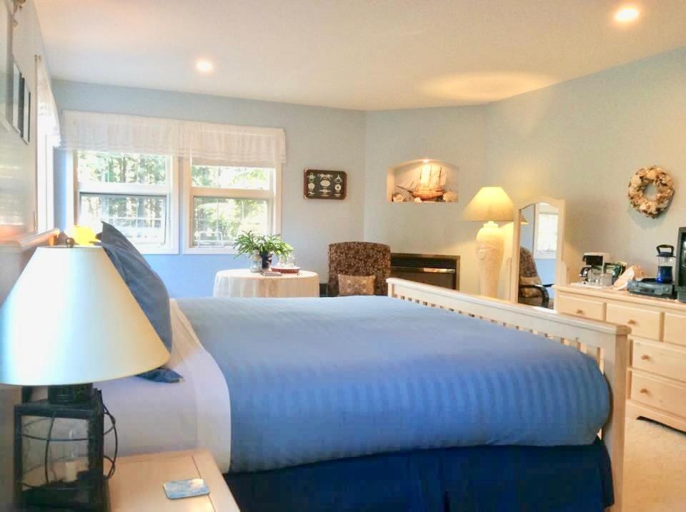 Een bed of bedden in een kamer bij Seafarer Bed & Breakfast